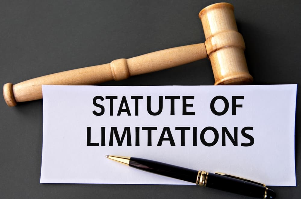 Statute of limitations: Text displayed on a dark background with a judge's gavel.
